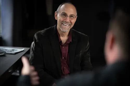 Business leader photographed in a natural workplace setting