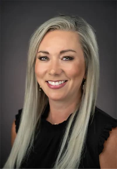 Polished professional studio portrait for an investment professional