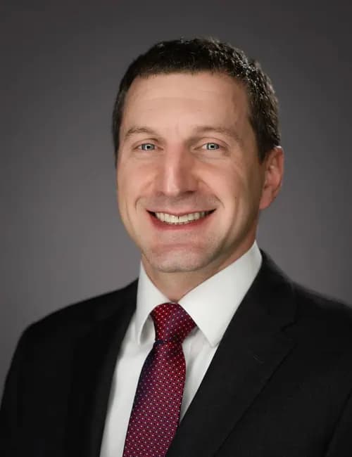 Board-ready professional studio portrait for a civic or nonprofit director