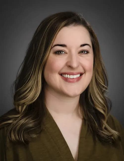 Polished professional studio portrait for a commercial broker