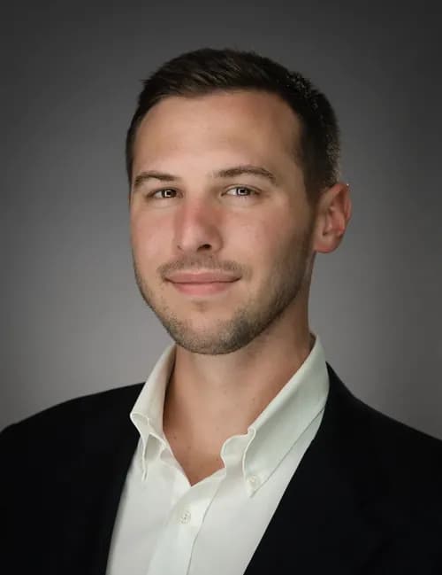 Focused professional studio portrait for a medical researcher