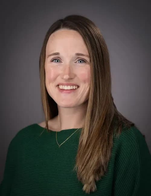 Welcoming professional studio portrait for an association executive