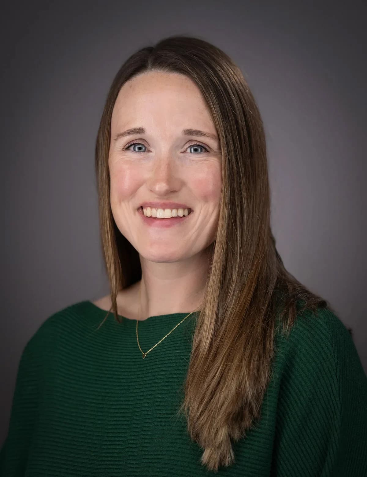 Welcoming professional studio portrait for an association executive