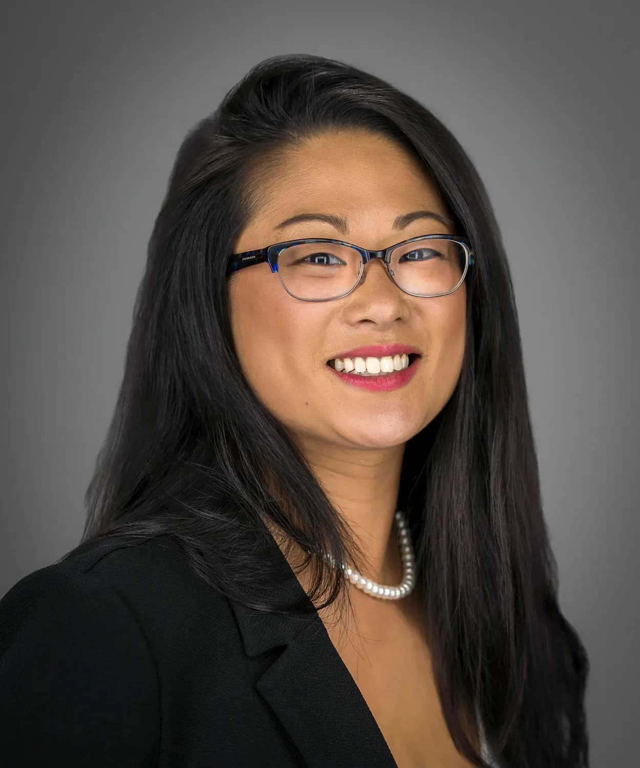 Grounded professional studio portrait for an urban planner